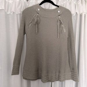 Skyes the limit grey sweater with functional snaps & zippers on each side.